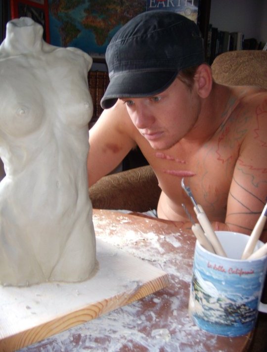 Abram Boise working on sculpture